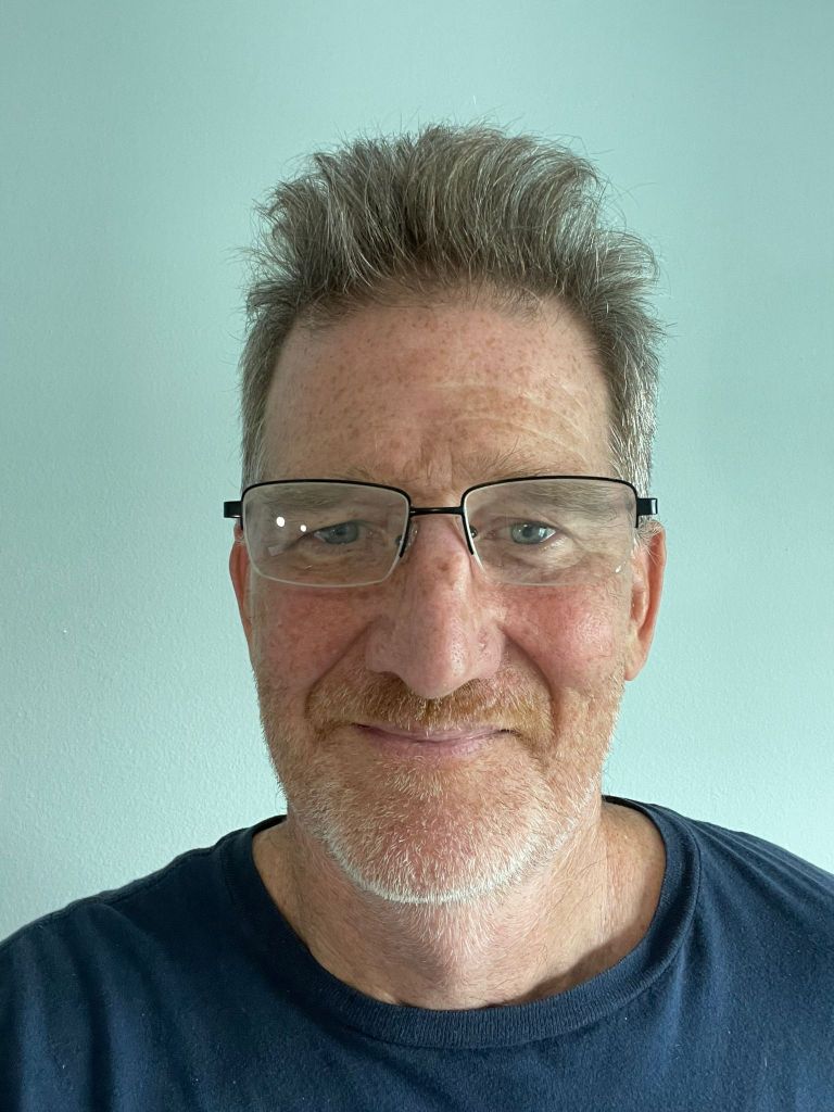 Author image of Simon Yeats showing a man wearing glasses. 